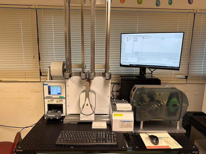 Automation platform containing PlateLoc, BenchCel, and plate labeler (left to right)